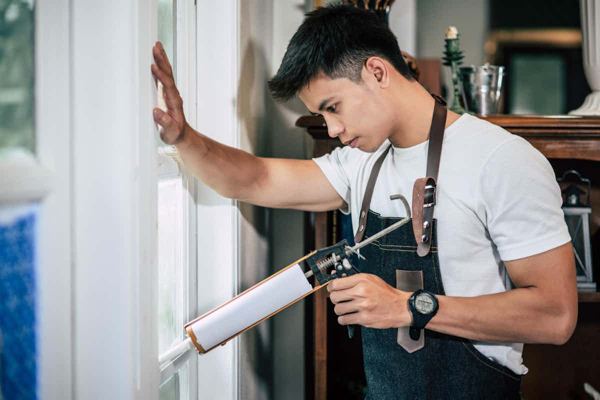 professional performing residential window repair